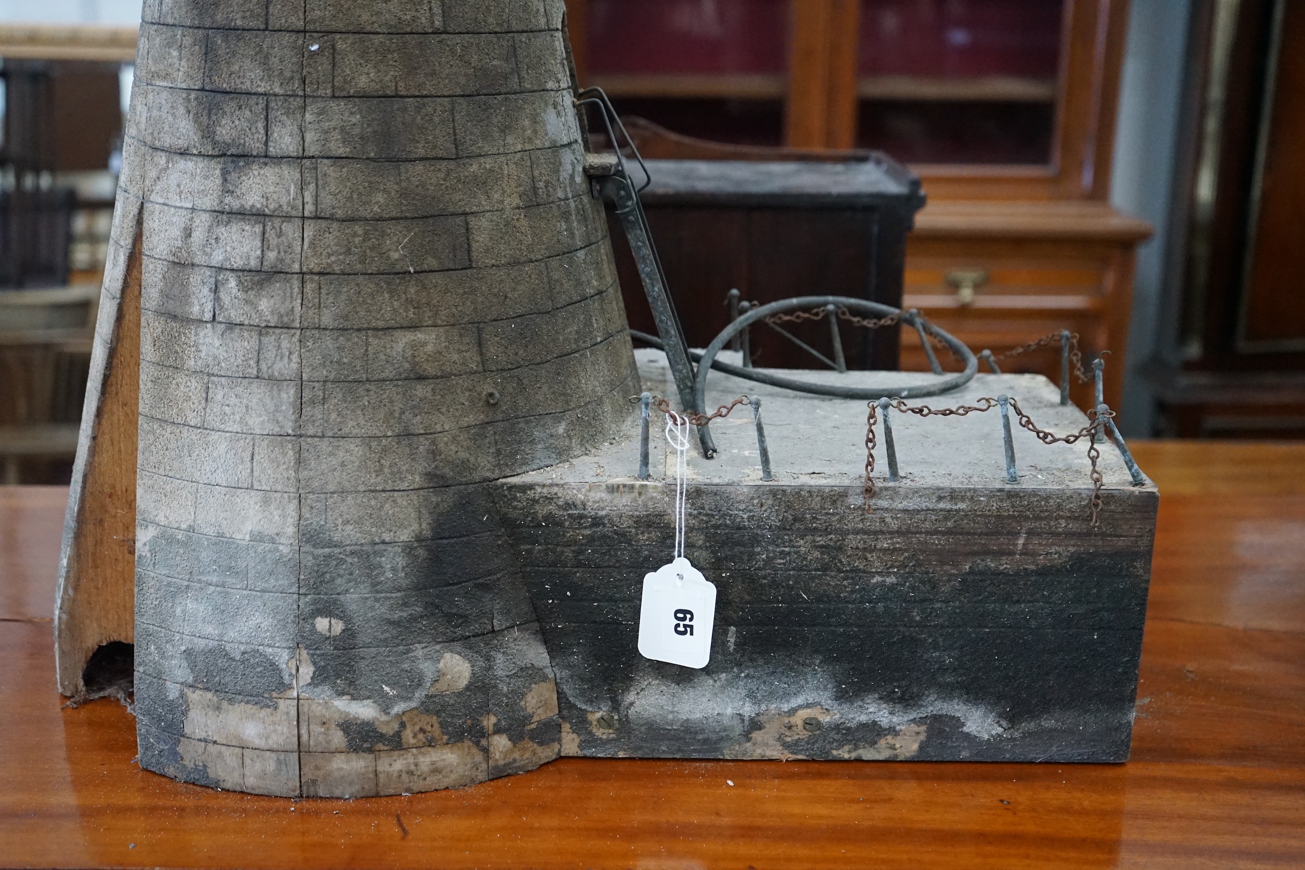 A vintage brick effect wood model lighthouse, wired for electricity height 110cm